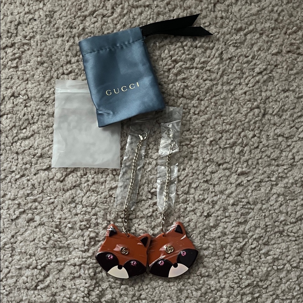 Gucci raccoon accessories/Pouch with Gold Accent